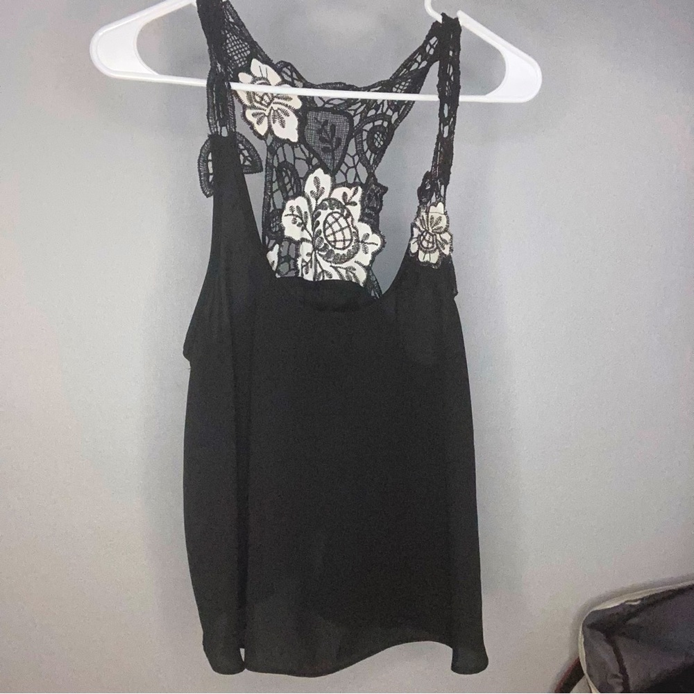 Dressy black shirt with knitted pattern on top